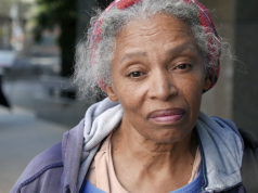 elderly african american homeless woman looks directly into camera with sad eyes ho3y 8u27 thumbnail 1080 01